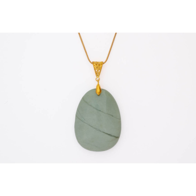 Serprentine green gemstone pendant on a silver coloured necklace