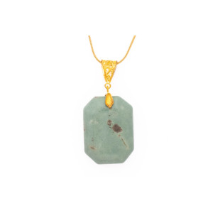 Aventurine gemstone pendant on a gold coloured necklace