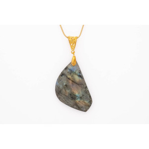 Labradorite gemstone pendant on a gold goloured necklace