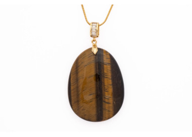 Tiger eye gemstone pendant on a gold coloured necklace