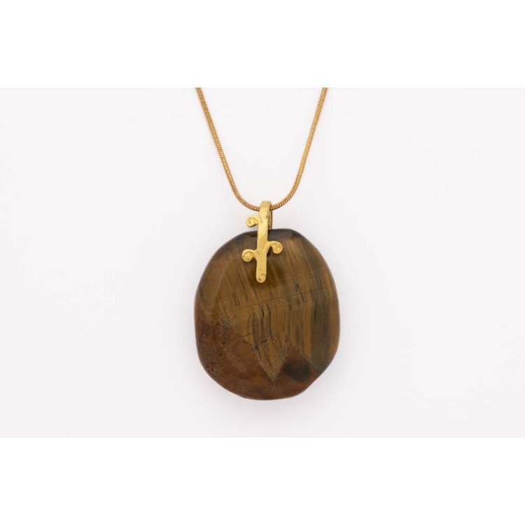 Tiger Eye gemstone pendant on a gold coloured necklace