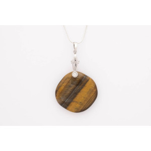 Tiger Eye gemstone pendant on a silver coloured necklace