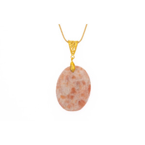 Sunstone cabouchon pendant on a gold coloured necklace