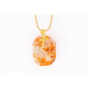 Calcite red orange gemstone pendant on a gold coloured necklace