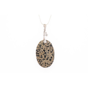 Dalmatian gemstone pendant on a silver coloured necklace