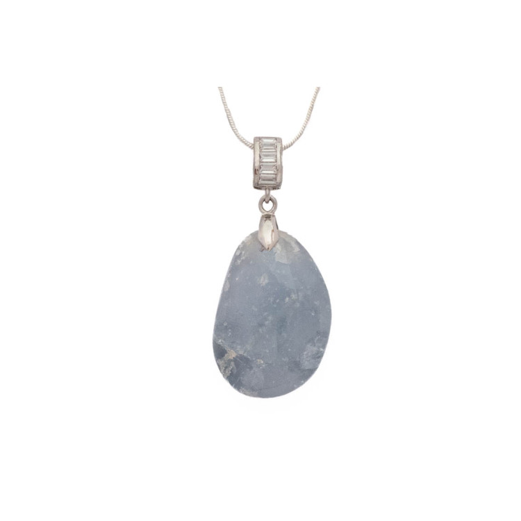 Blue aqua quartz gemstone pendant on a silver coloured necklace