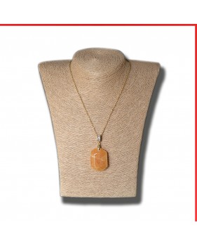 Calcite Orange Pendant on a gold coloured necklace