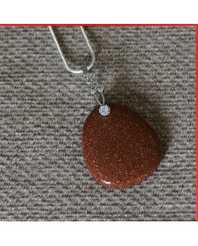 Red Sandstone Pendant on a silver coloured necklace