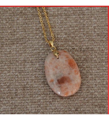 Sunstone Pendant on a gold coloured necklace