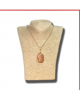 Calcite Red Orange Gemstone Pendant on a gold coloured necklace