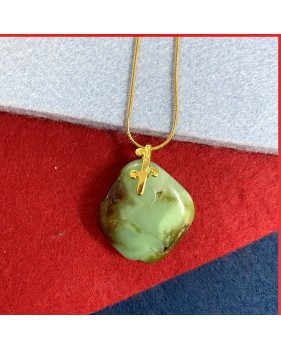 Chrysoprase Australia green gemstone pendant on a gold coloured necklace