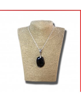 Hypersthene gemstone pendant on a silver coloured necklace