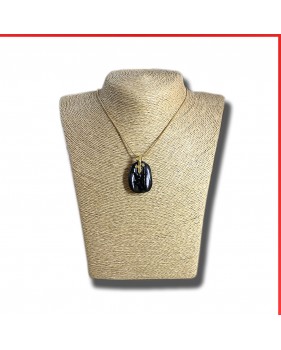 Hypersthene gemstone pendant on a gold coloured necklace