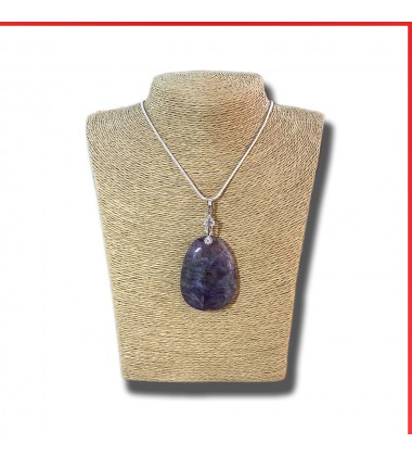 Fluorite purple gemstone pendant on a silver coloured necklace