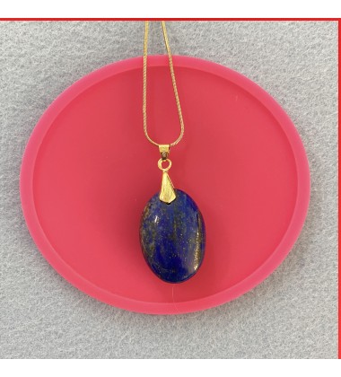 Lapis Lazuli cabouchon pendant on a gold coloured necklace